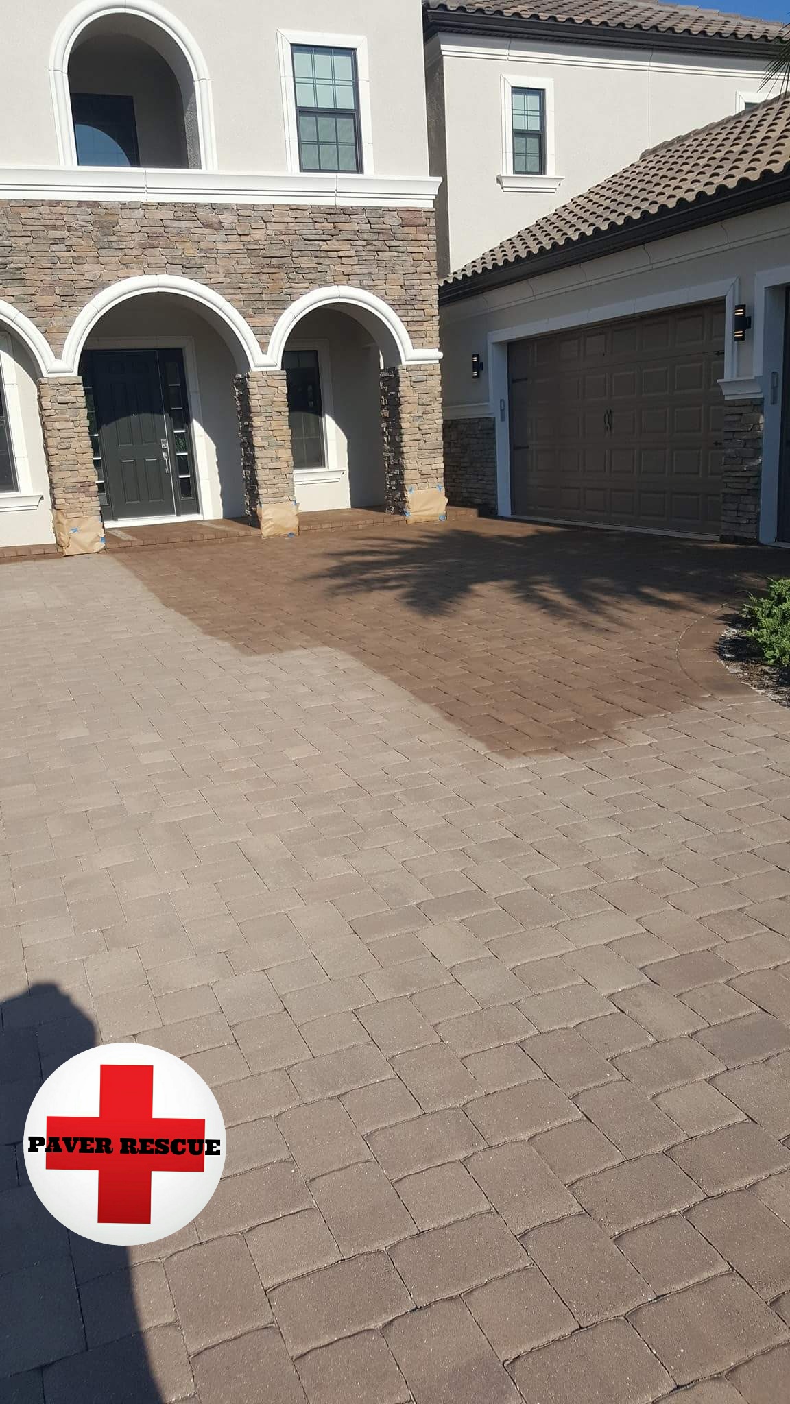 Freshly installed brick paver driveway at a Florida Mediterranean-style home, showcasing driveway paver installation in St. Petersburg FL