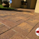 Close-up of paver joints on a Tampa FL patio showing sand erosion and gaps between pavers needing stabilization