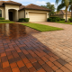 Freshly sealed paver driveway at a Tampa Bay Florida home showing restored color after rainy season fading