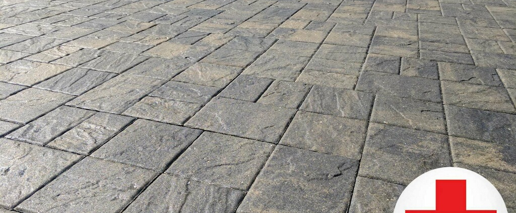 Freshly sealed paver driveway in St. Petersburg FL showing rich gray tones and clean finish by Paver Rescue LLC